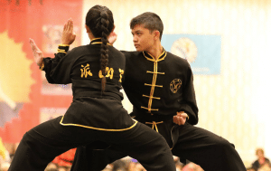 Two Children in Competitive Kung Fu Stance